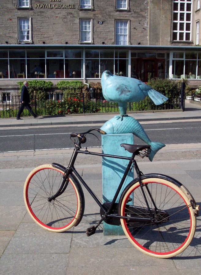 Sunbeam and fish sculpture