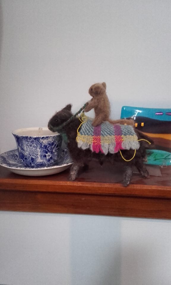 small and sheep on the mantelpiece